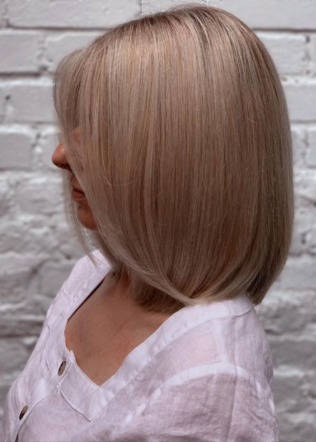 Creamy blonde highlights on a shoulderlength bob done by Anna at the klinik salon 