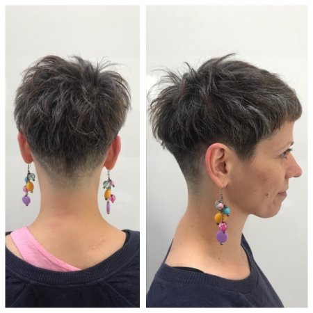 A short hair has been shaved underneath to create a flatter side and give a disconnected top layer throughout the haircut.