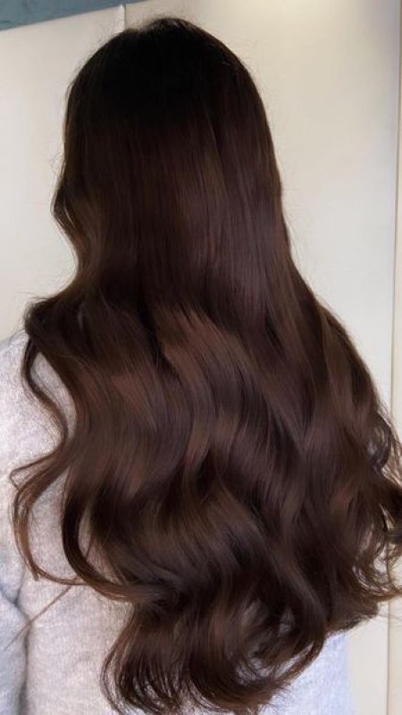 Long dar brown hair on a client at the klinik salon London done by Leyla 