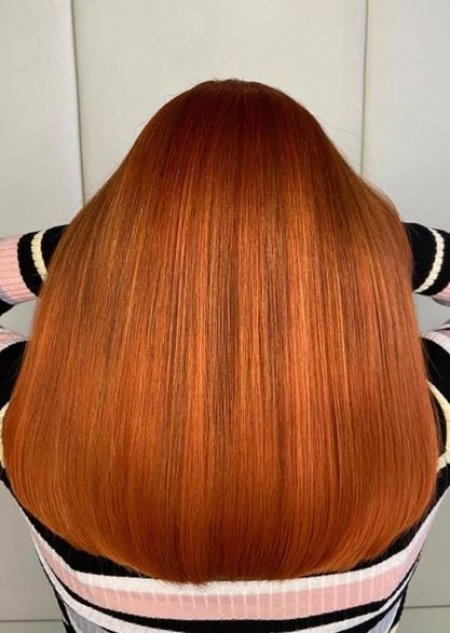 Bright copper toned hair at the klinik salon London
