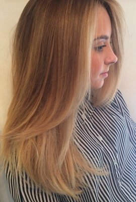 A balayage has been refreshed by adding baby highlight around the hairline by Thea at the klinik salon Islington London
