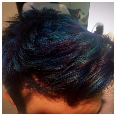 Hair transformed into a peacock colouring using Igora ColorWorx at the klinik hairdressing London