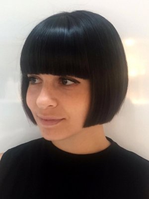 Hair has been cut into a short bob with a full fringe by leyla at the klinik hairdressing in London Farringdon