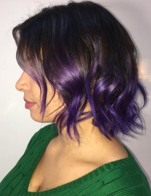 Hair that started to naturally grow out with lighter tips has been given a little injection of colour to add a bit of fun. Lilac on this occasion by Leyla at the klinik hairdressing London
