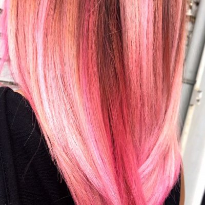 Hair pre lightened and then coloured pink with Fudge Pink Moon by Thea at the klinik salon Lodon