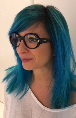Hair  being coloured Blue by using Manic panic woodoo colour by Thea at the klinik salon London Islington