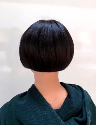 Short black haired bob cut by our graduate stylist Yasmin at the klinik hairdressing.