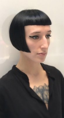 New stylist Mark at the klinik cuts a strong bob with a short fringe.