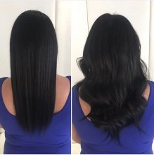 Dark brown almost black shoulder long hair being extended long by Leyla at the klinik hairdressing using the Easilocks System. 