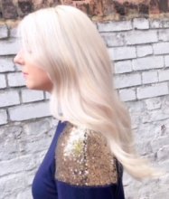Long hair has been highlighted to create a platinum blonde with Olaplex by Letla at the klinik hairdressing in London