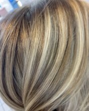 many tones og highlights throughout a blonde hair close up photo, the klinik salon