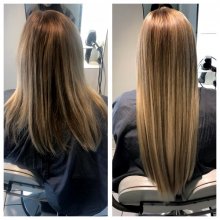 Long hair being extended by Leyla using Easilocks hair giving a natural look at the klinik hairdressing London 
