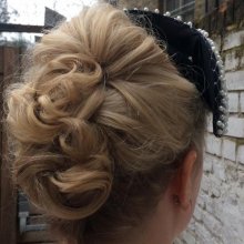 Blonde hair updo, personally entwined and pinned with loose curls