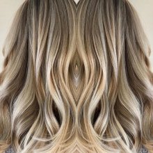 Blonde highlights with dark pieces in between at the klinik hairdressing London
