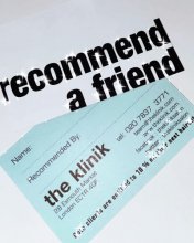 Recommend a friend cards at the klinik in white and blue text